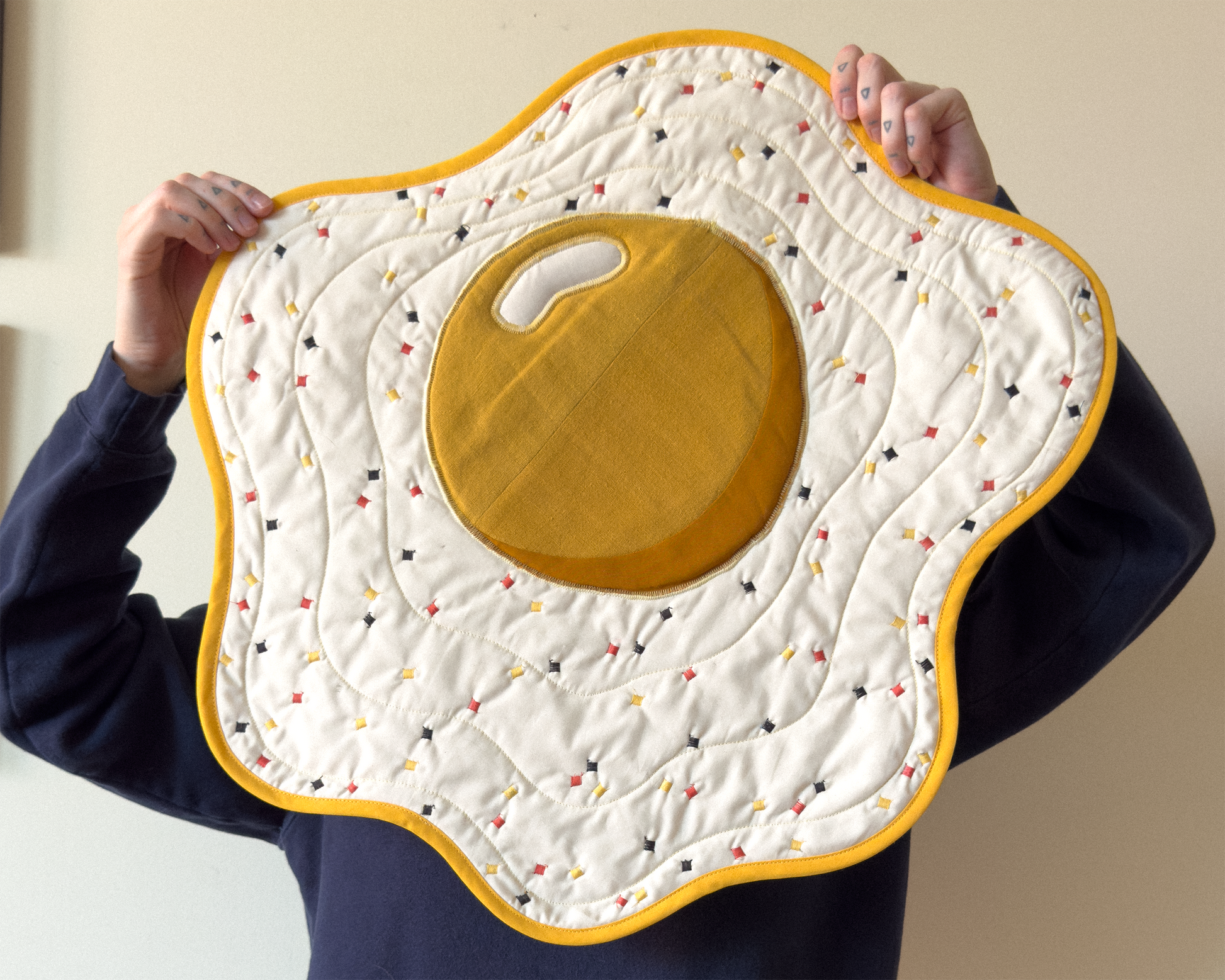 fried egg wall quilt