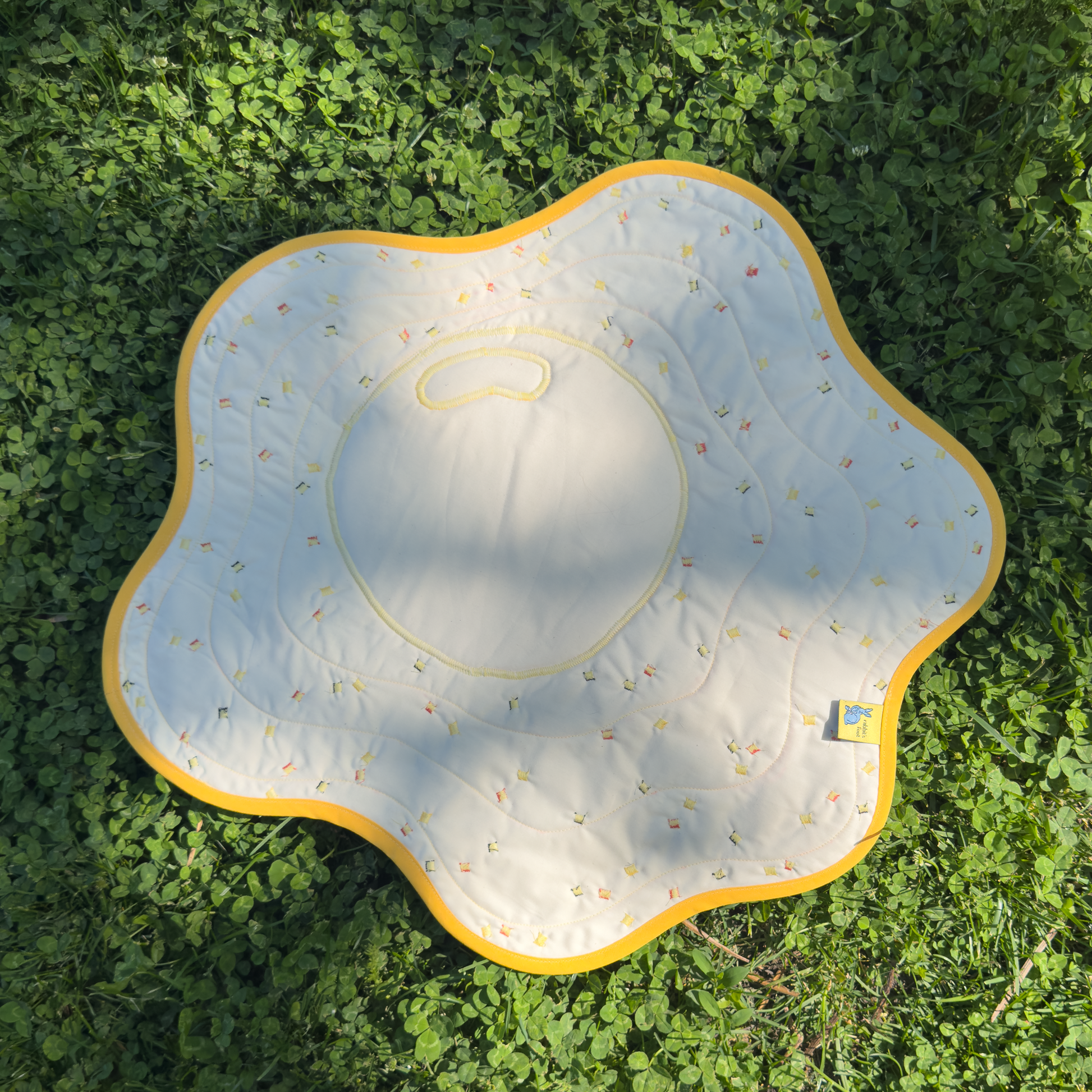 fried egg wall quilt