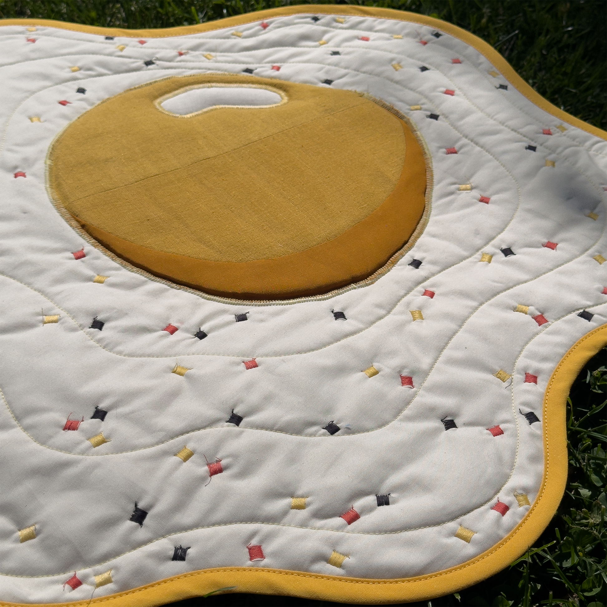 fried egg wall quilt