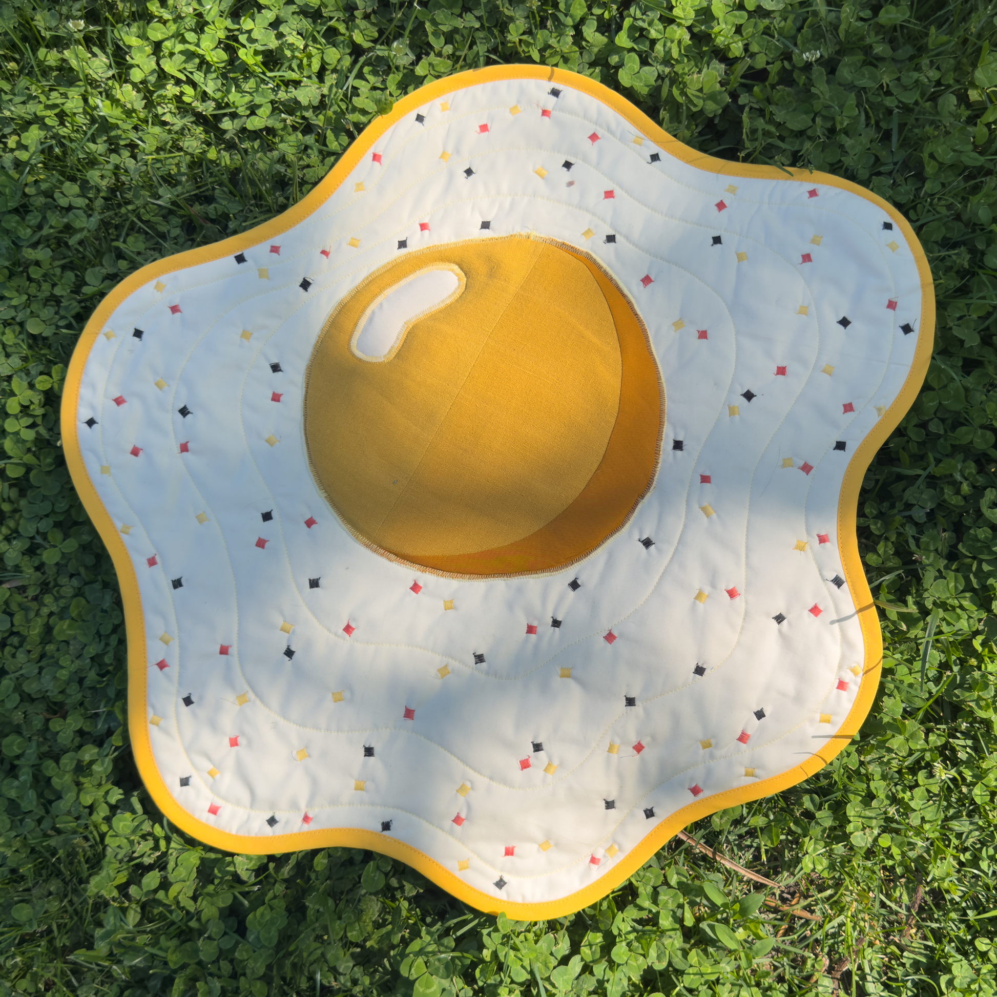 fried egg wall quilt