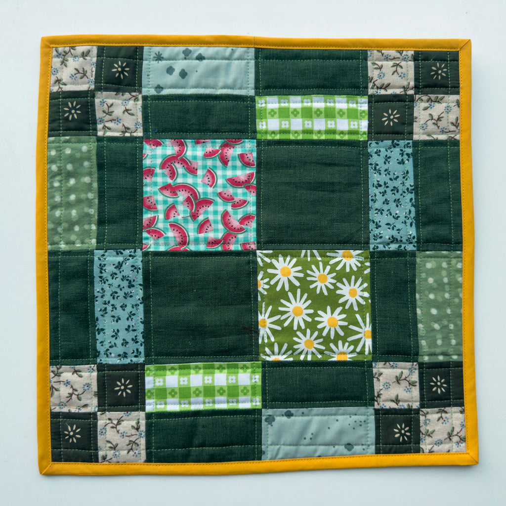greens patchwork wall quilt