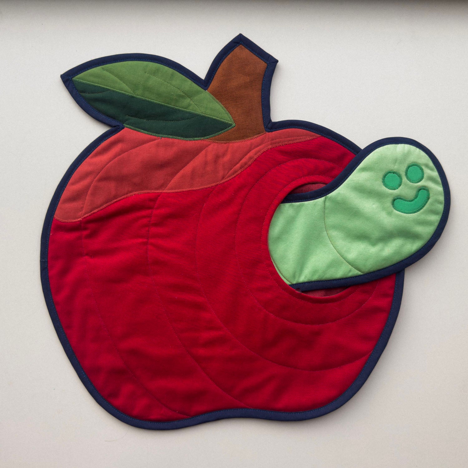 wormy apple wall quilt