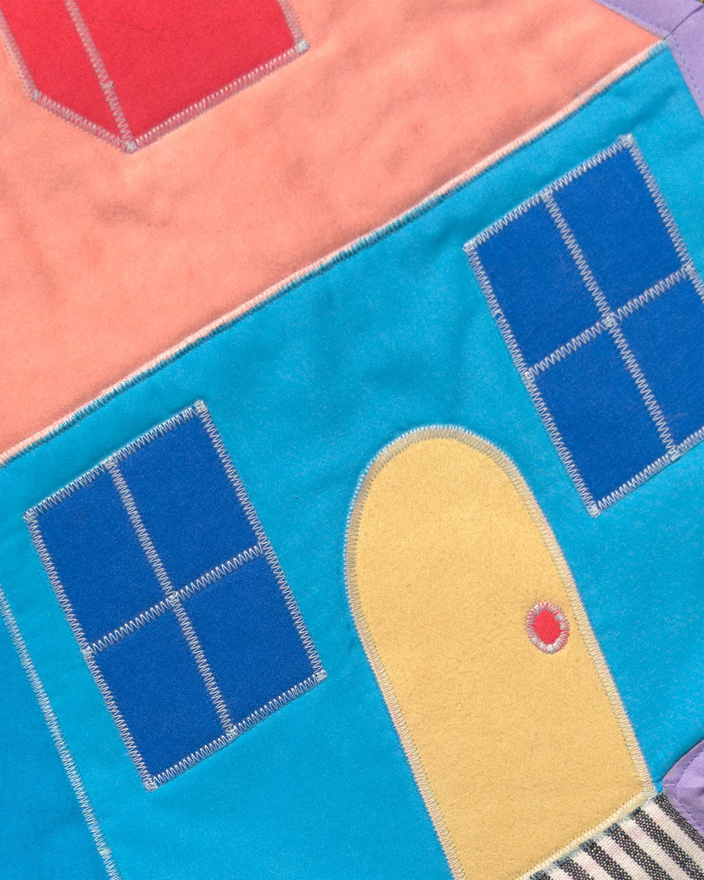house with leggies wall quilt