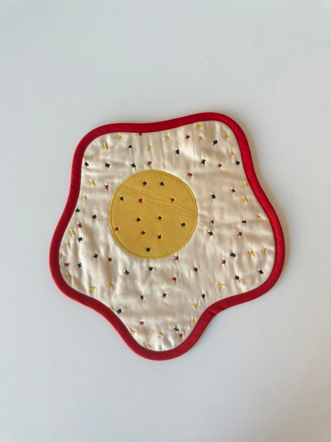 fried egg wall quilt