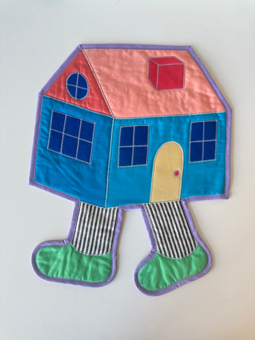 house with leggies wall quilt