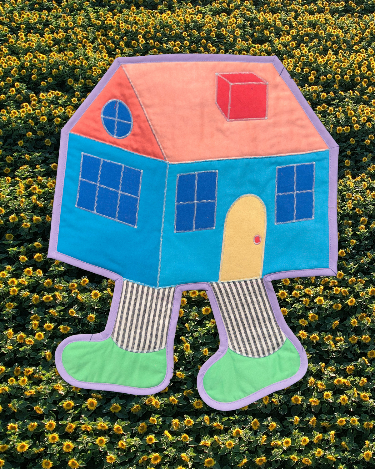 house with leggies wall quilt