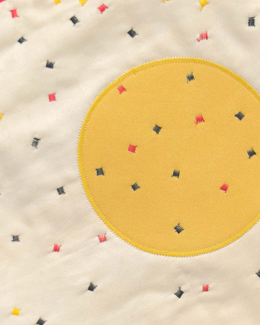 fried egg wall quilt